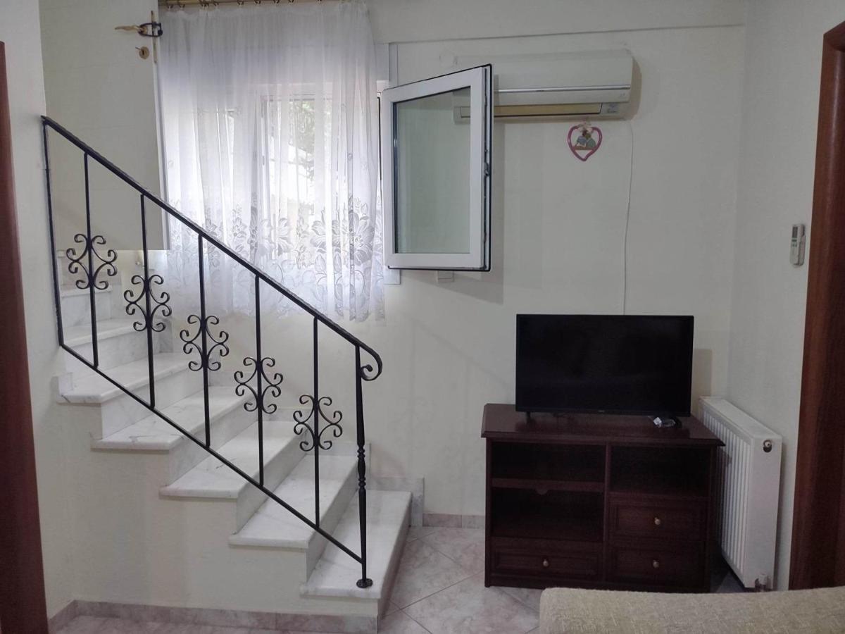 Artemis Luxury Villa Palaiontsiflikion Bagian luar foto